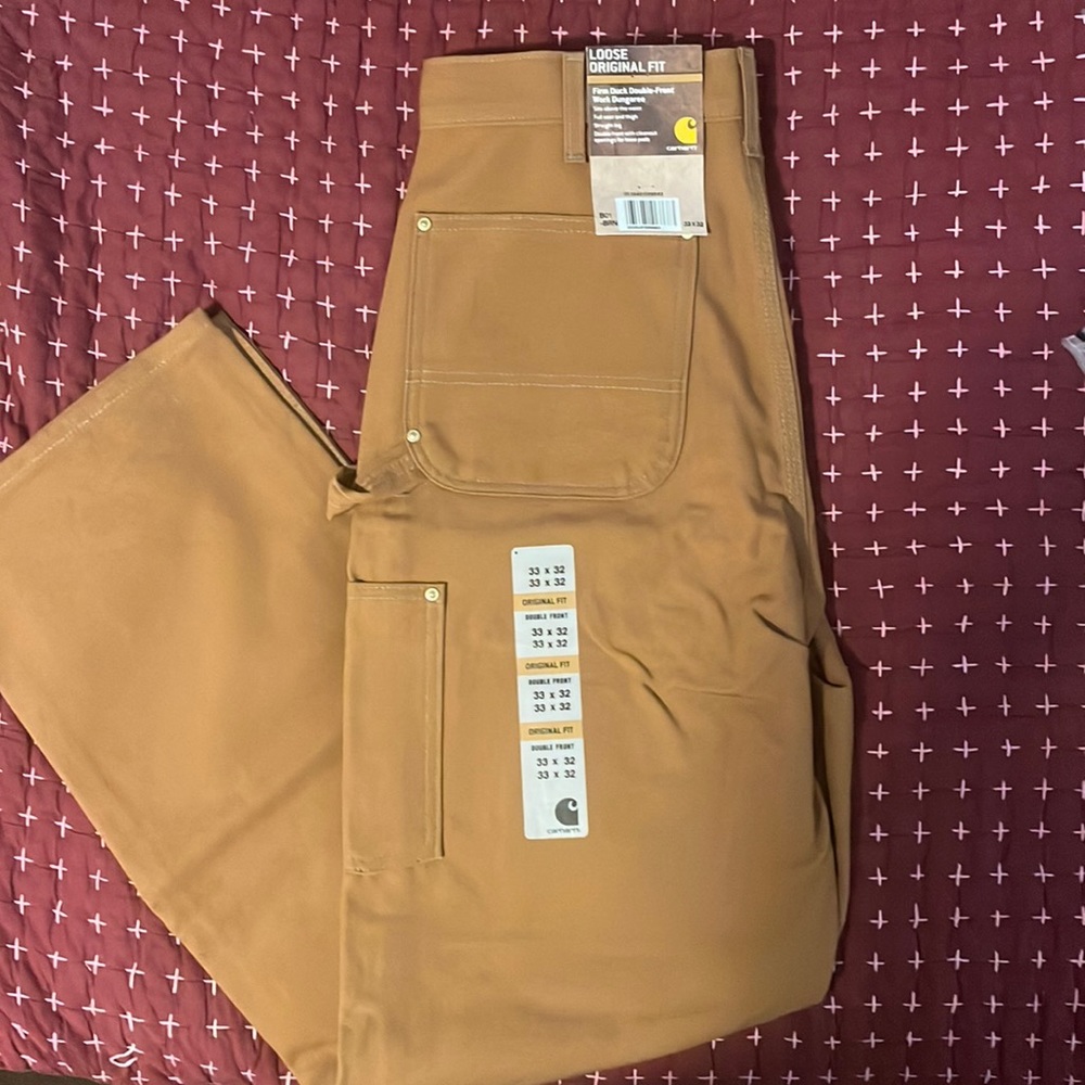 Carhartt NWT firm duck double-front work dungaree. Size 33x32